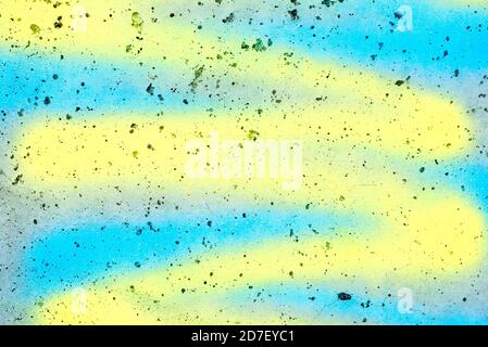 A graffiti painting detail in blue and yellow. Stock Photo