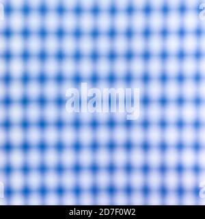 Close up of a blurred blue and white cross pattern and texture, as chess table. Blue and white chess table. Stock Photo