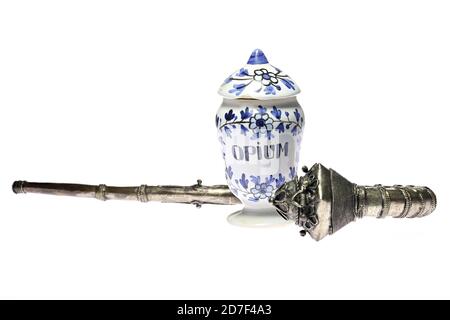 vintage apothecary jar and opium pipe isolated on white background Stock Photo