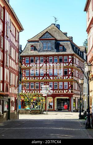 Herborn, Germany - April 22 2019: Half-timbered houses on Marketplace (Marktplatz) in Herborn. Hessen, Germany Stock Photo