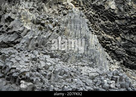 Backdrop from basalt volcanic rock formations in Reinisfjara beach near Vik in northern Iceland Stock Photo