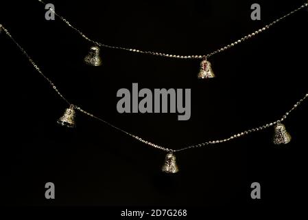 silver bells hanging in a row, christmas decorations Stock Photo