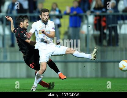 (201023) -- RIJEKA, Oct. 23, 2020 (Xinhua) -- David Silva (L) of Real Sociedad vies with Ivan Tomecak of HNK Rijeka during their UEFA Europa League Group F football match in Rijeka, Croatia, Oct. 22, 2020. (Slavko Midzor/Pixsell via Xinhua) Stock Photo