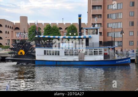 Steamboat operated by Hampton Roads Transit (HRT) connects downtown Norfolk to Old Town Portsmouth across Elizabeth River in Norfolk, Virginia VA, USA Stock Photo