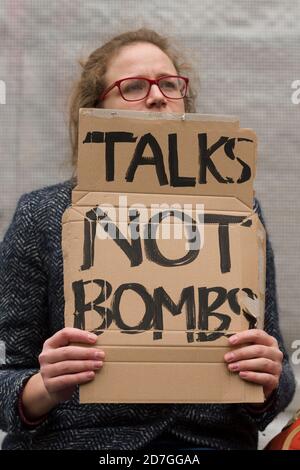 Don’t bomb Syria demonstration, organised by the Stop the War Coalition. The demonstration is in response to likely vote in Parliament in the next week over whether Britain should join the bombing campaign against Islamic State in Syria. The vote is in response to the recent Islamic State terrorist attack in Paris, Downing Street, Westminster, London, UK.  28 Nov 2015 Stock Photo