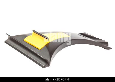 Scraper for cleaning windows from frost and water isolated on a white background. Stock Photo