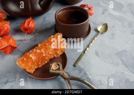 crystals of grape sugar, Oriental sweetness. A piece of crystal grape sugar for tea. Copy space. Stock Photo