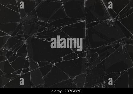 Black cracked glass texture background. Crack on the glass. Broken screen. Broken dark phone.  White cracks in glass Stock Photo
