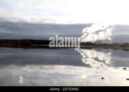 Shewalton, North Ayrshire, Scotland, UK ,Caledonian Paper Mill,  Steam from the mill reflecting in water Stock Photo