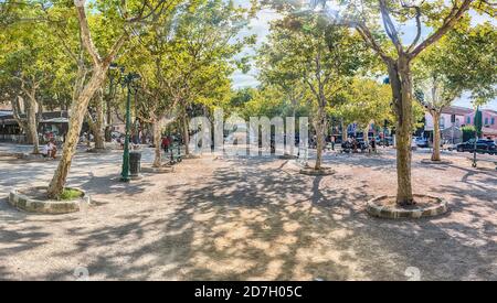 SAINT-TROPEZ, FRANCE - AUGUST 16: The scenic Place des Lices in Saint-Tropez, Cote d'Azur, France, August 16, 2019. The square is both home to a Prove Stock Photo