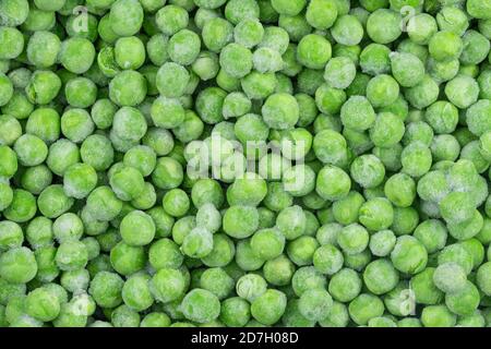 Frozen green peas texture background. ice peas background for food textures. Raw vegetables. Stock Photo