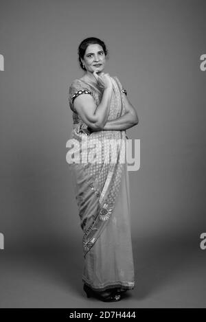Mature beautiful Indian woman wearing Sari Indian traditional clothes Stock Photo