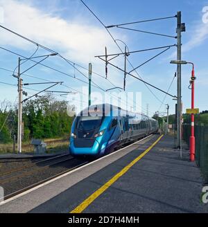 TransPennine North West Express Class 397 Civity, for Manchester Airport, approaching Oxenholme Lake District Station. Cumbria, England, United Kingdo