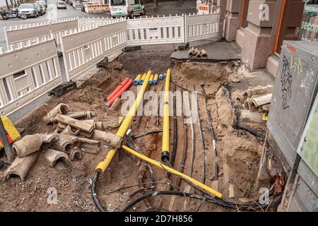 Underground electric wire replacement on a sidewalk in Helsinki, Finland Stock Photo