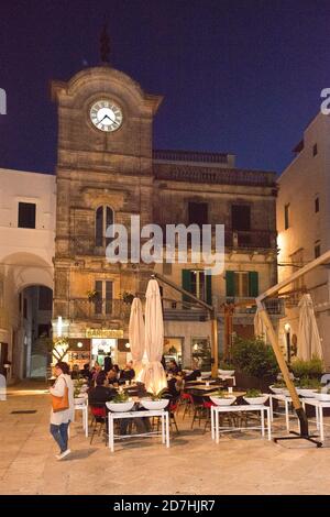 Restaurant Trattoria pavement terrace at night, Cisternino, Puglia, Italy Stock Photo