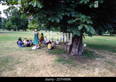 Primary school groups attend a music and arts event at the Serpentine Gallery in London’s Hyde Park. 26 June 1992. Photo: Neil Turner Stock Photo