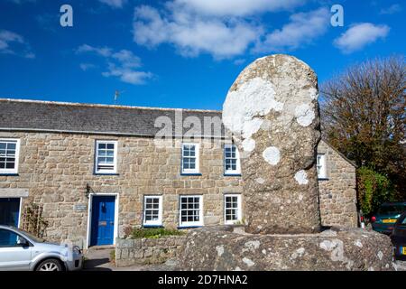 St Buryan church in West Cornwall with an ancient stone cross. Stock Photo