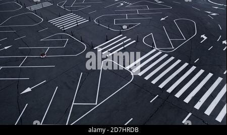 Empty Parking with white bright markings for proper parking Stock Photo