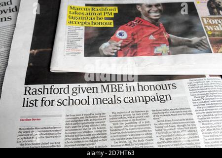 Footballer Marcus Rashford MBE honours Guardian newspaper headlines headline articles school meals campaign on 10 October 2020 England UK. Stock Photo