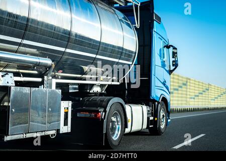 Long vehicle tank trailer on a highway Stock Photo