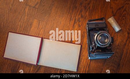 Notebook mock up for artwork with film camera Top view. Stock Photo