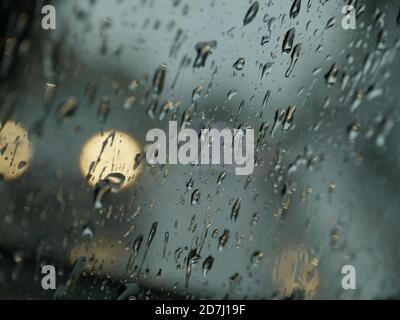 drops of autumn rain on the windshield of the car Stock Photo