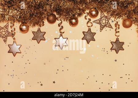 Christmas composition. Christmas balls, stars, gift boxes, ribbons and candles. New year decorations on blue background. Flat lay, top view, copy space Stock Photo