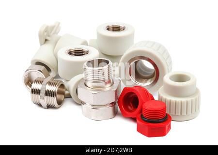 Set of metal-plastic plumbing couplings, adapters, plugs isolated on ...