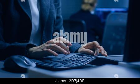 Dynamic Shot of the Hands Typing and Elevating to Female Portrait. Professional Woman Working on Computer. Stock Photo
