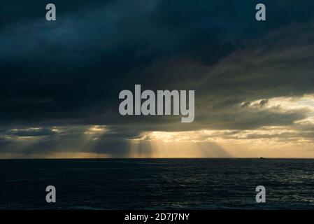 Stormy sky over dark ocean Stock Photo