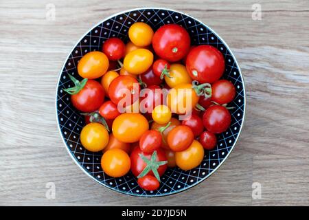 Bowl of fresh ripe tomatoes Stock Photo