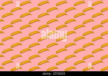 Yellow banana slicer arranged on colored background Stock Photo