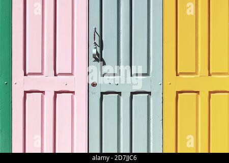 building exterior with colorful wooden gate Stock Photo