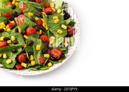 Mexican salad with black beans, corn,tomatoes,lettuce and pepper isolated on white background Stock Photo