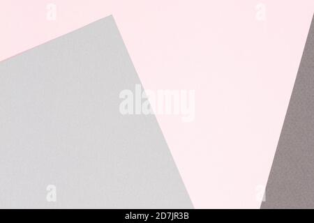 Abstract colored paper texture background. Minimal geometric shapes and lines in pastel pink and light gray colours Stock Photo
