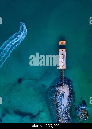 Aerial view of pier with small boat at Lake Cuyamaca, 110 acres ...