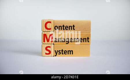 Concept words 'CMS, content management system' on cubes and blocks on a beautiful white background. Copy space, business concept. Stock Photo