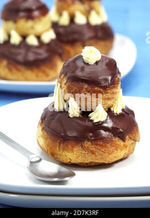 PLATE WITH FRENCH CAKES CALLED CHOCOLATE RELIGIEUSE Stock Photo