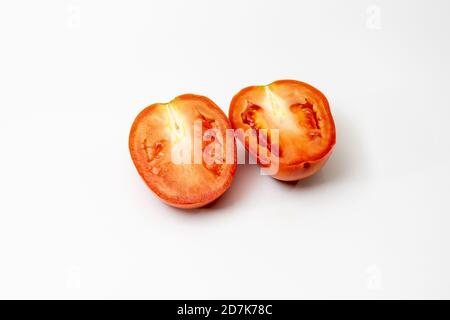 Sliced delicious tomato on white background Stock Photo