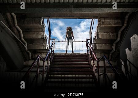 Fit Woman Doing Workout at a Stadium Stock Photo