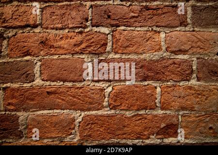 Weathered stained old brick wall background Stock Photo