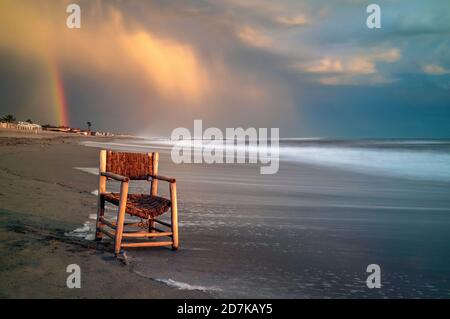 Alone in a winter sunset in a Tuscany beach Stock Photo