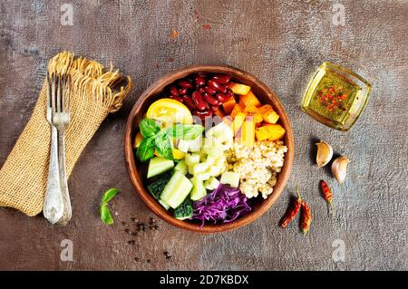 buddha bowl with vegetables in brown bowl Stock Photo