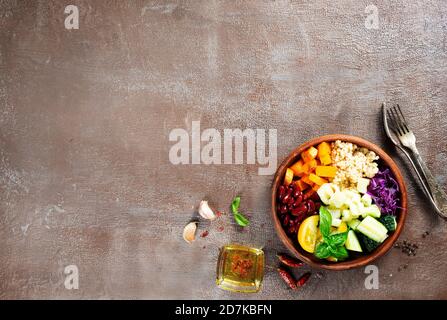 buddha bowl with vegetables in brown bowl Stock Photo