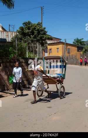 Editorial. A Rickshaw taxis in the streets of Madagascar Stock Photo