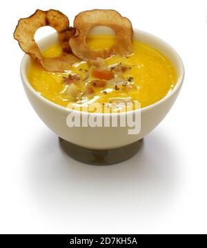 butternut squash and apple soup for halloween dinner isolated on white background Stock Photo