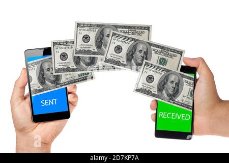 money dollars transfer between mobiles or smartphone isolated on white. Contactless payment NFC Stock Photo