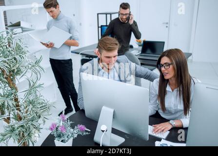 group of employees works in a modern office. Stock Photo
