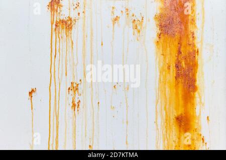 Metal painted wall background with strong stains of corrosion. Stock Photo
