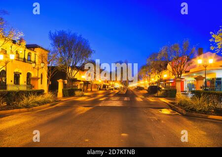 Night time street with bright lights in Dubbo city downtown of Australia - historic traditional regional town. Stock Photo